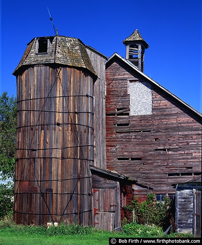 rural;country;agriculture;agricultural;farm buildings;Askov MN;cupola;Minnesota;old;red barn;rustic;spring;decrepit;silo