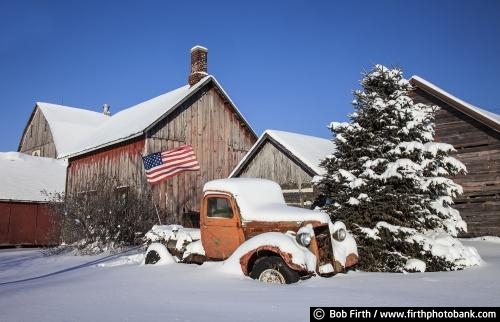 automobile;Cars and Trucks;classic cars;collectible;Collector Truck;rural;old trucks in snow;snow covered trucks;snow covered vintage automobiles;rust;patina;rusty;rusty truck;moldering truck;weathered truck;snow covered truck;vehicle;old pickup truck;vintage;vintage pickup truck;MN;Minnesota;country;American flag;barn;farm