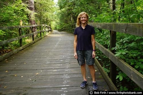 Itasca State Park;northern Minnesota;destination;explore;Great River Road;Headwaters;hiker;hiking;MN;path;pathway;summer;tourism;tourist;trail;trees;up north;upper Mississippi River;walking;wooden bridge;woodlands