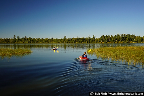 Itasca State Park;Lake Itasca;Headwaters;Mississippi River;boating;boat;kayaking;kayaker;destination;explore;man;MN;northern Minnesota;paddle sport;pine trees;quiet water;summer;tourism;tourist;transportation;travel;up north;upper Mississippi River;woman