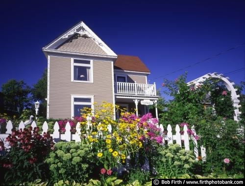 Excelsior;historic;home;house;Lake Minnetonka area;Minnesota;MN;summer;white picket fence;trellis;flowers;Minneapolis suburb