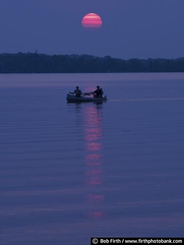 boat;canoe;canoeing;bluffs;couple;dusk;forest fire sunset;Great River Road;Mighty Mississippi;Minnesota;Mississippi River;MN;peaceful;quiet water;silhouette;sun;twilight;water;WI;Wisconsin
