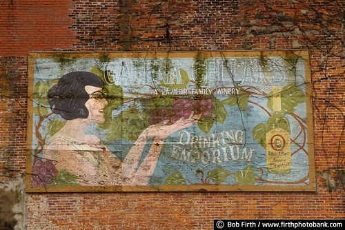 brick wall;building;Galena IL;sign;signage;Illinois;advertising;alcohol;beverage;face;hand painted;liquor;wall art;woman;peeling paint;old signs;historic