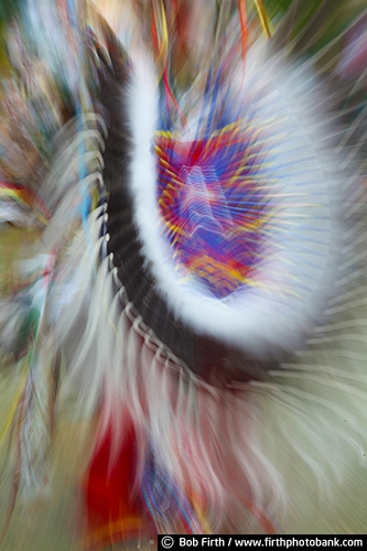 Native Americans;Native American Indians;Pow Wow;cultural;culture;dancer;Indian dancers;dancing;powwaw;social gathering;regalia;authentic design;customs;tradition;traditional;traditional ceremonies;Wacipi;American Indian gathering;celebration of life;tribes;dancing motion;dancing abstract;feathers;colorful feathers;feathers used by Indians;feathers used in regalia;feather bustle;Native American beadwork;colorful beads;beadwork;man