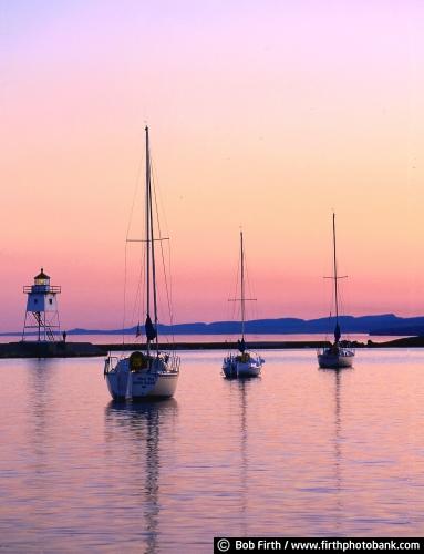 twilight;sunsets;Sawtooth Mountains;sailboats;pink;pier;northern Minnesota;North Shore towns;North Shore Scenic Drive;North Shore lighthouses;North Shore destinations;North Shore;moody;Minnesotas North Shore;Minnesota;lighthouse;Lake Superior Water Trail;Kitchi Gammi;Lake Superior;Grand Marais Lighthouse;Grand Marais;MN;light station