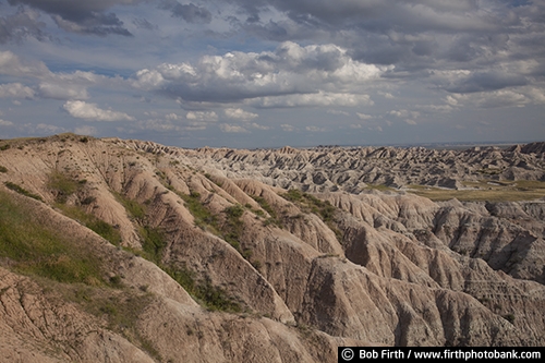 Badlands National Park SD;tourism;southwestern South Dakota;solitude;destination;erosion;rugged;geologic deposits;mixed grass prairie;sharply eroded buttes