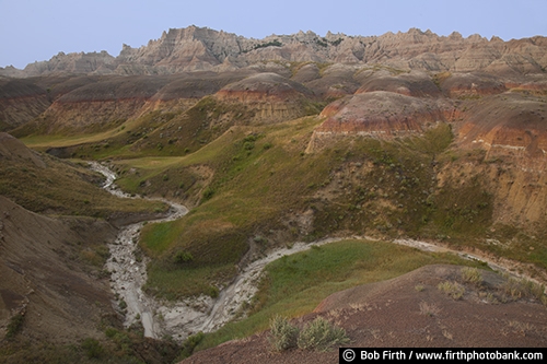 Badlands National Park SD;tourism;southwestern South Dakota;solitude;destination;erosion;rugged;geologic deposits;mixed grass prairie;sharply eroded buttes;stream;river