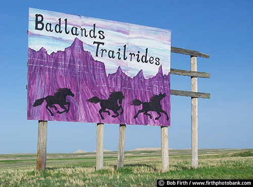 Badlands National Park SD;tourism;sign;signage;information;horseback riding;horse;horses;destination;business sign;billboard;advertising;southwestern South Dakota