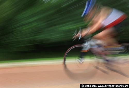 bicycling;bikes;blur;Chaska;cyclist;fast;helmet;Minnesota;motion;panning;race;speed;summer;triathalon;man;River City Davys;River City Days;bicycles;cycling;MN;competition