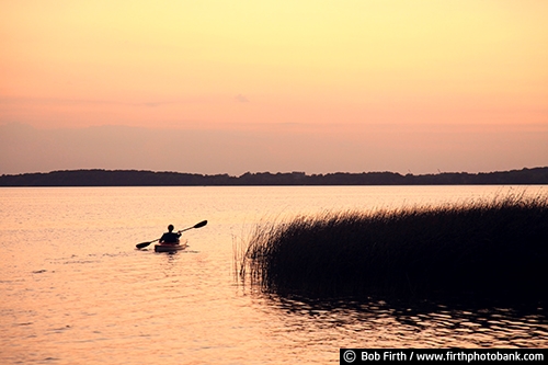 kayak;kayaking;fun pastime;Lake Waconia;Minnesota;MN;paddle sport;peaceful;person;recreational;silhouette;solitude;summer;sunset;water sport;woman