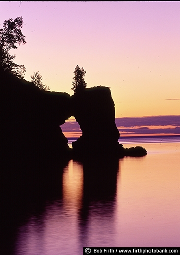 Lake Superior;Kitchi Gammi;largest freshwater lake;Minnesotas North Shore;MN;northern Minnesota;peaceful;shoreline;tourism;water;destination;biggest fresh water lake;Arch Rock;calm water;dramatic sky;Great Lakes;large rock formation;moody;pink;silhouettes;sunset;sunrise;Tettegouche State Park;twilight