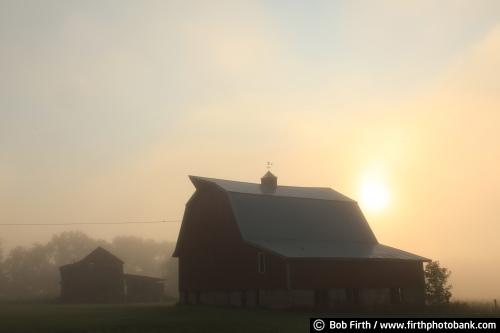 Wisconsin;silhouette;morning;foggy;barn;agricultural scene;hazy;sunrise;golden light;yellow sky;homestead;old barn;WI